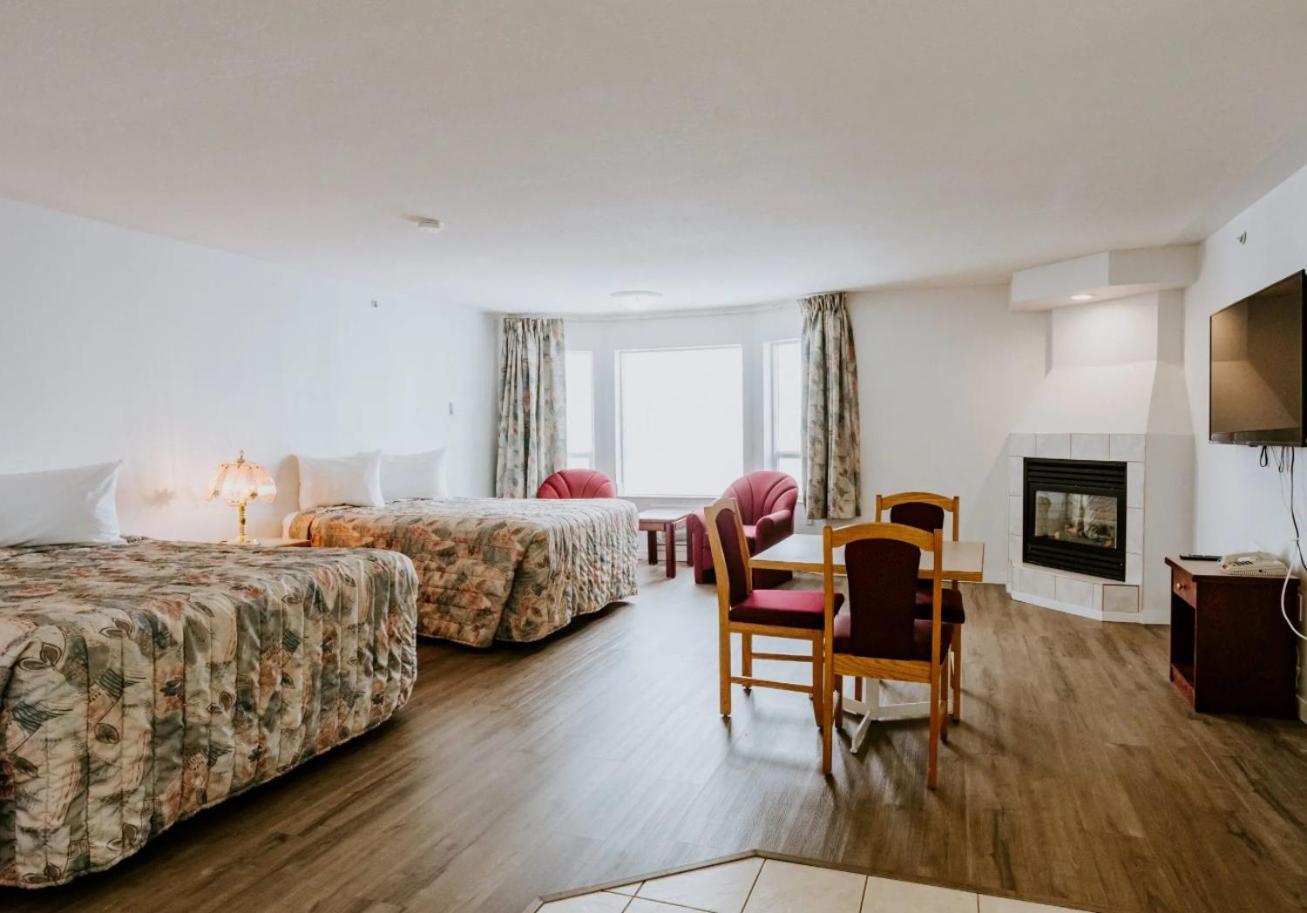 Western Budget Plus Mosaic Suites Penhold Kültér fotó