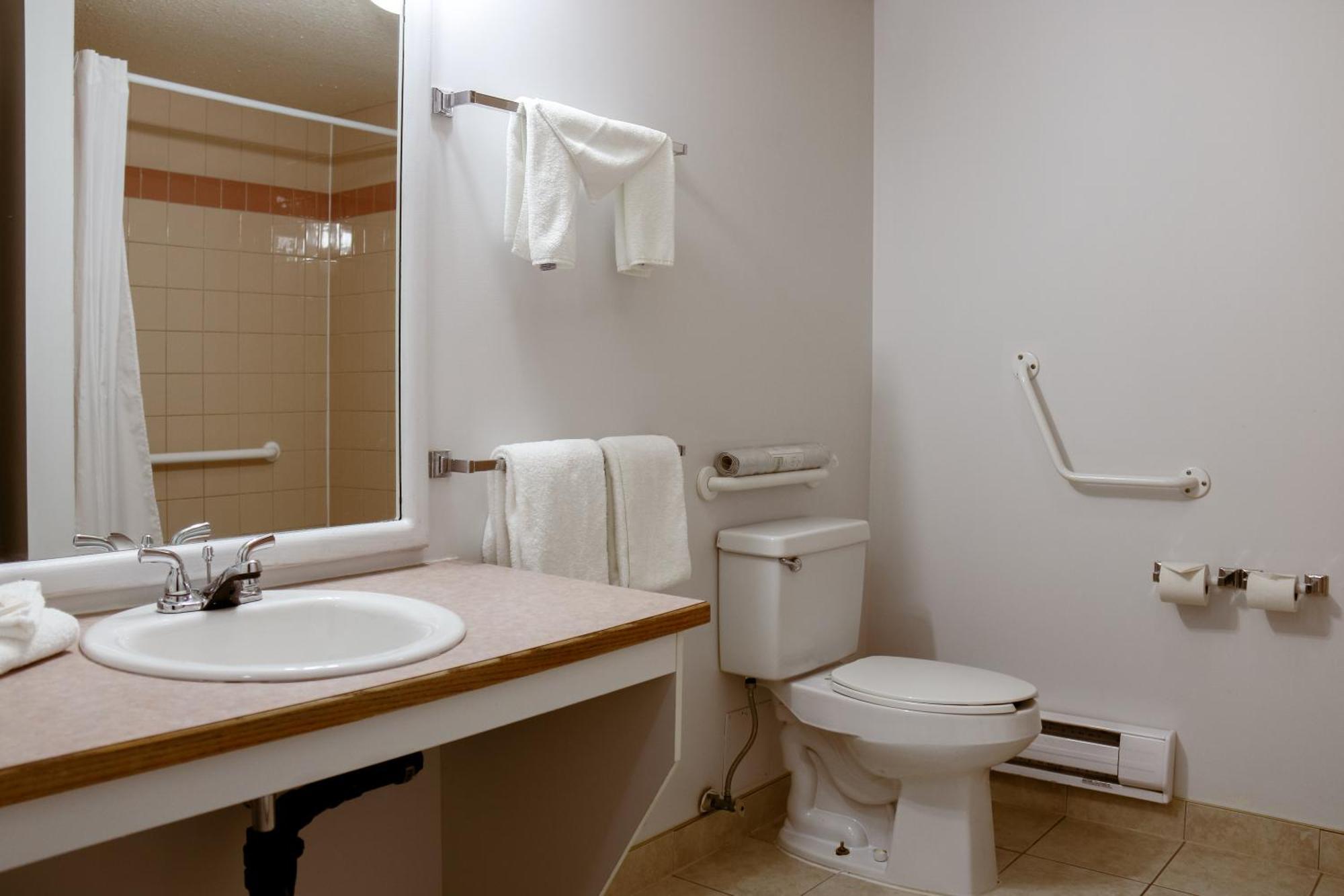 Western Budget Plus Mosaic Suites Penhold Kültér fotó