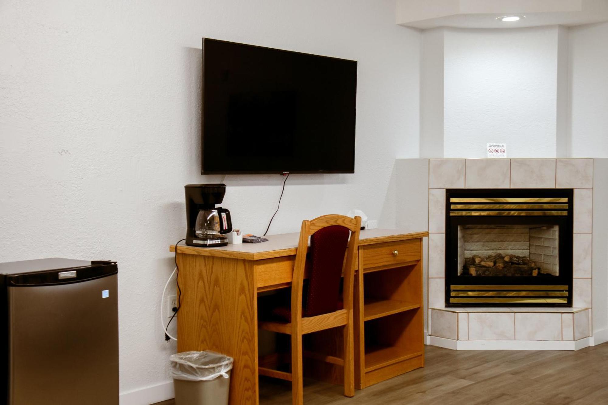 Western Budget Plus Mosaic Suites Penhold Kültér fotó
