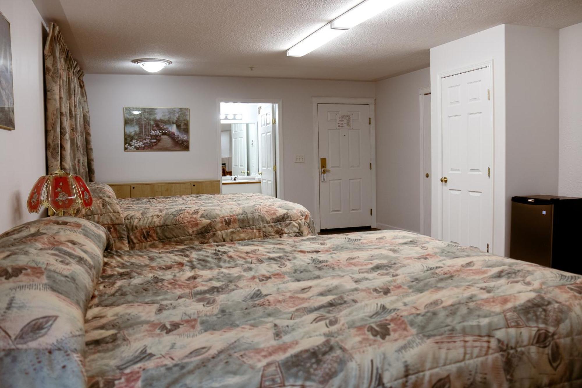 Western Budget Plus Mosaic Suites Penhold Kültér fotó