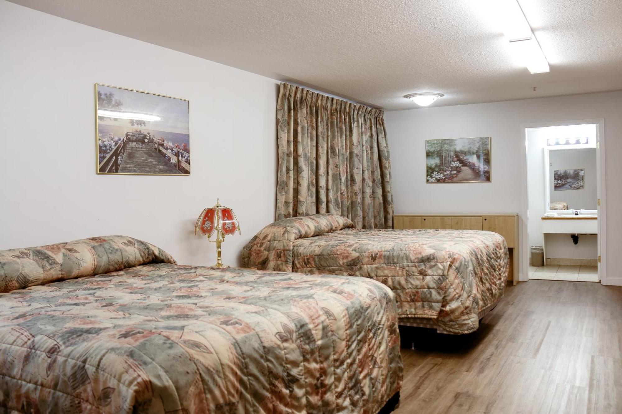 Western Budget Plus Mosaic Suites Penhold Kültér fotó